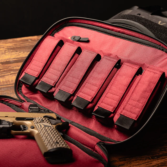 Kinetic 2 Pistol Bag open with pistols and magazines in the interior.